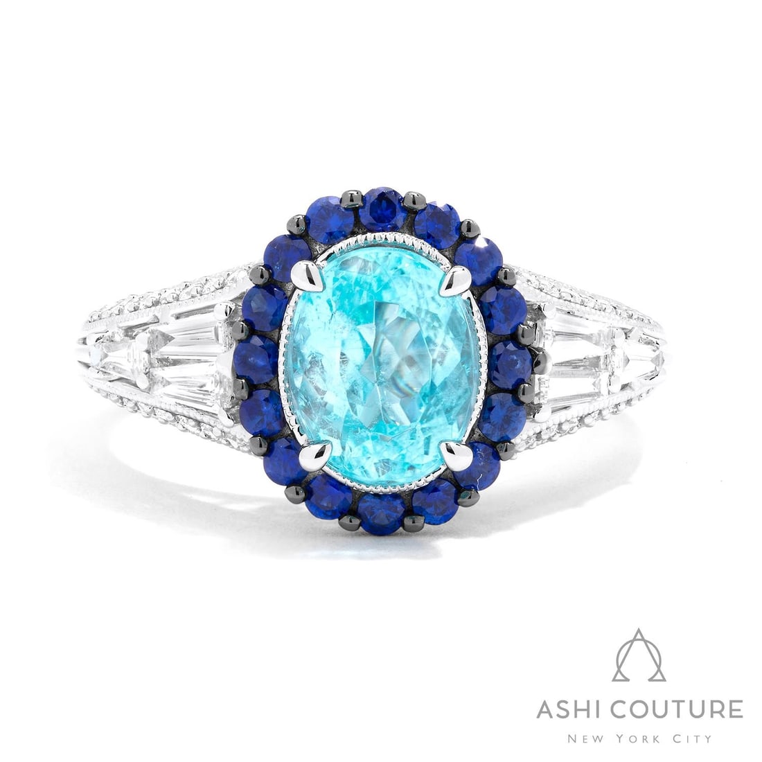 Oval Aquamarine and 0.55 ctw Diamond 18K White Gold Ring: Rare and radiant, this magnificent Halo ring featuring Aquamarine, Blue Sapphire, White Diamond offers a touch of the extraordinary. A detailed Halo gallery secures the stones, rendered in 5.2 grams o