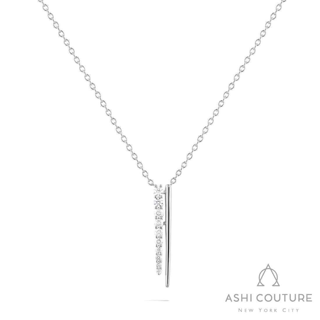0.49 ctw Diamond Line & Bar 18K White Gold Pendant Necklace: Rare and radiant, this stunning Line & Bar pendant necklace featuring White Diamond offers a touch of the extraordinary. Showcasing the gems in a Line arrangement, the pendant necklace consists of 2.1