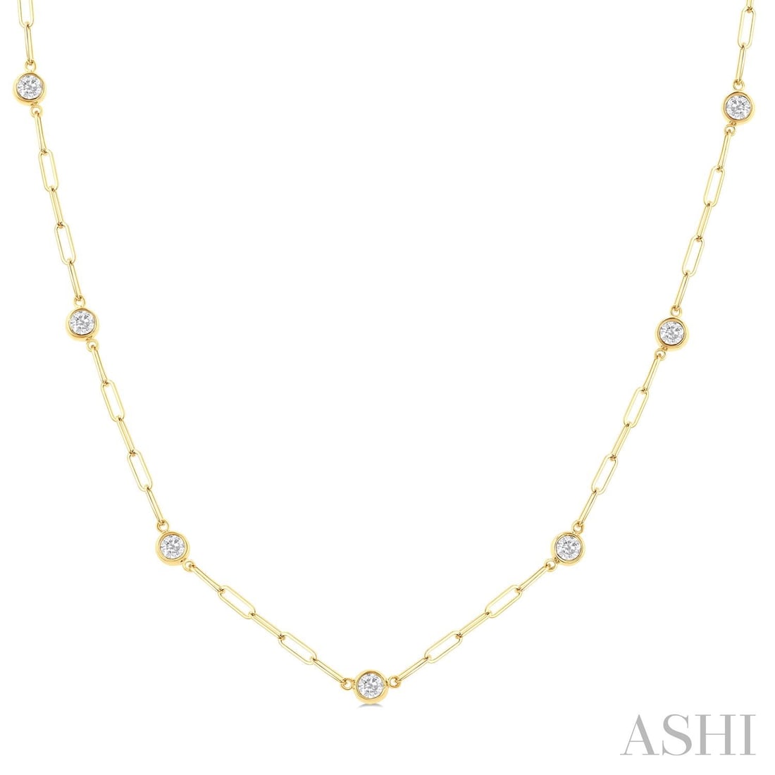 0.77 ctw Diamond Bezel Set Paperclip Station 14K Yellow Gold Necklace: Epitomizing grandeur, this exquisite Paperclip Station necklace featuring White Diamond stands as a beacon of refined taste. Showcasing the gems in a Station arrangement, the necklace consists of 3.15