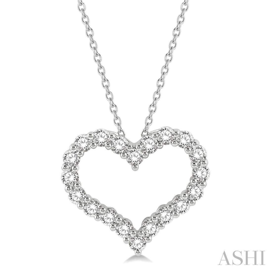 1.5 ctw White Diamond Heart Shape 14K White Gold Pendant Necklace: Epitomizing grandeur, this stunning Heart Shape necklace featuring White Diamond stands as a beacon of refined taste. Crafted with precision, the Halo setting is seamlessly integrated into 2.1 grams o