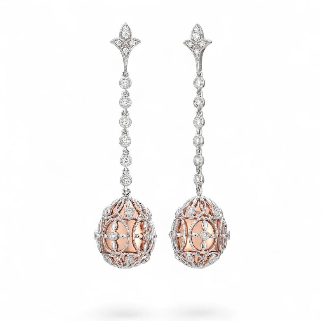 0.64 Ctw Mademoiselle Cage Drop White Diamond Modern 18K Rose & White Gold Earrings - Certified: Captured in a moment of brilliance, this stunning Mademoiselle Cage Drop pair of earrings featuring Natural Diamonds speaks to the connoisseur. Expertly mounted in a Drop setting, the earrings are cra