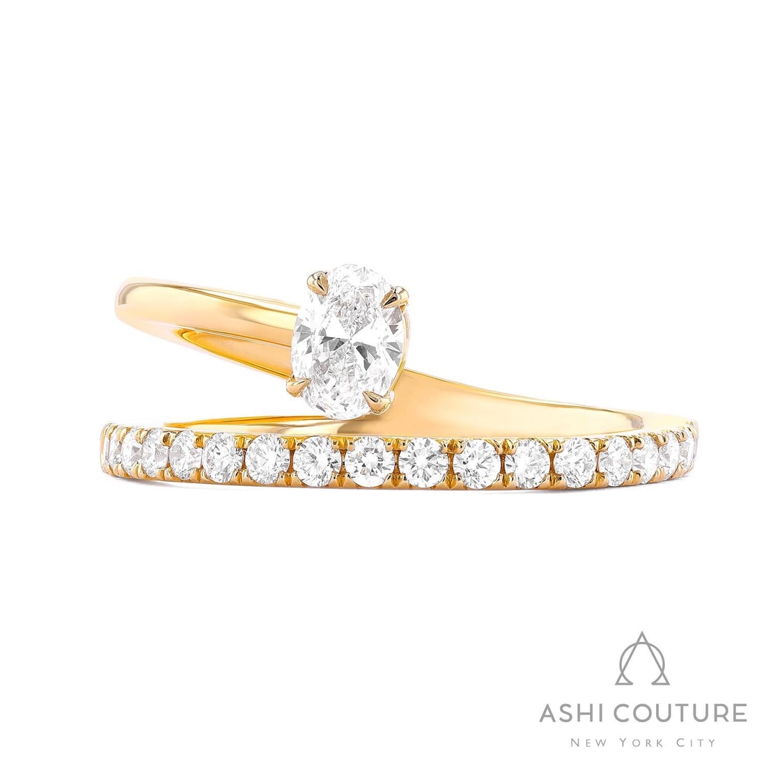 0.68 ctw Diamond Paradox Oval Open 18K Yellow Gold Ring: An exquisite masterpiece of haute joaillerie, this magnificent Paradox Oval Open ring featuring White Diamond is a true treasure. Showcasing the gems in a Bypass arrangement, the ring consists of 4.15