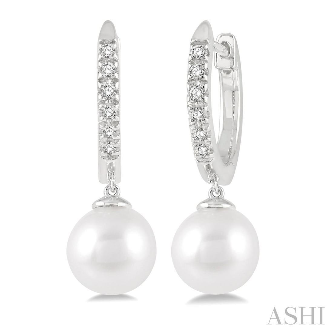 6mm Cultured Pearl and 0.12 ctw Diamond 10K White Gold Earrings: A symphony of light and color, this elegant Drop Petite Huggie pair of earrings featuring Cultured Pearl, White Diamond embodies the pinnacle of luxury. The gemstones are nestled within a Drop framewo