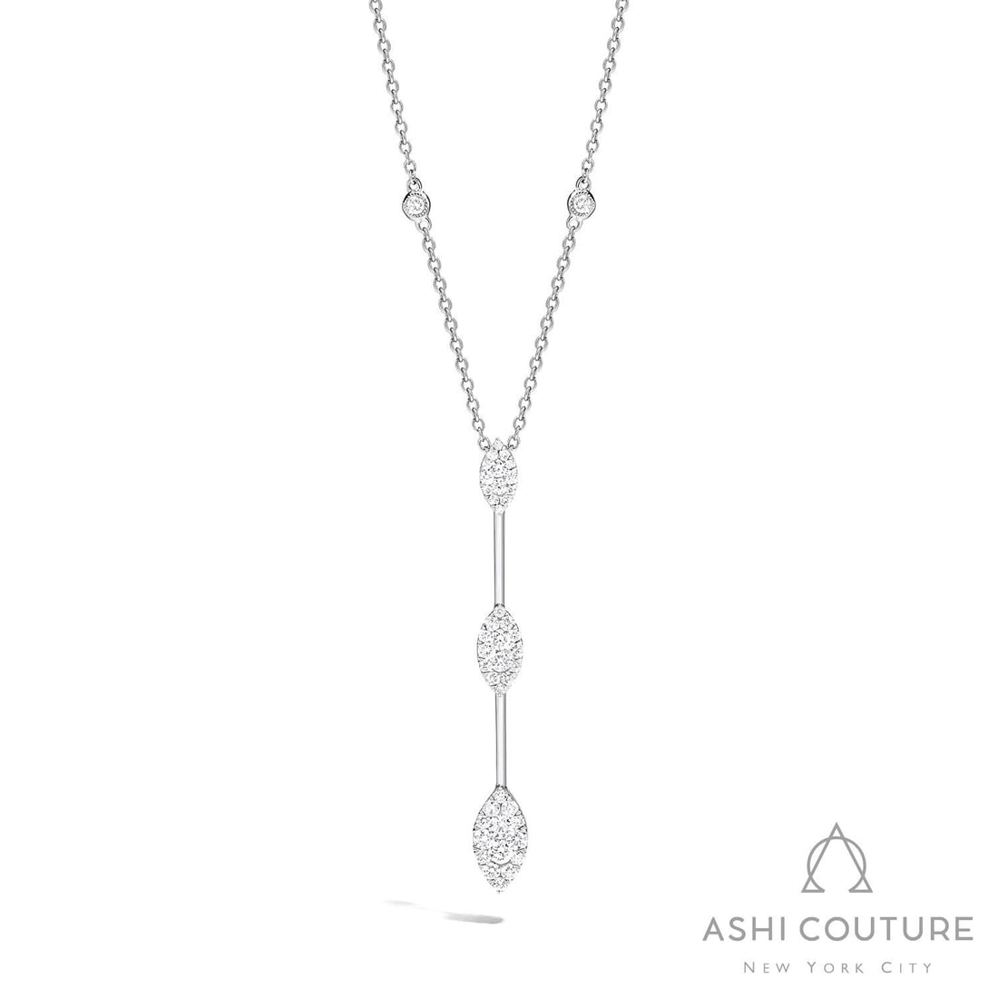 1.02 ctw White Diamond Fiori Cluster 18K White Gold Pendant: A vision of luxury, this stunning Fiori Marquise Bar Cluster necklace featuring White Diamond defines sophistication. Securely held in a classic Cluster design, the necklace is forged from 1.75 grams 