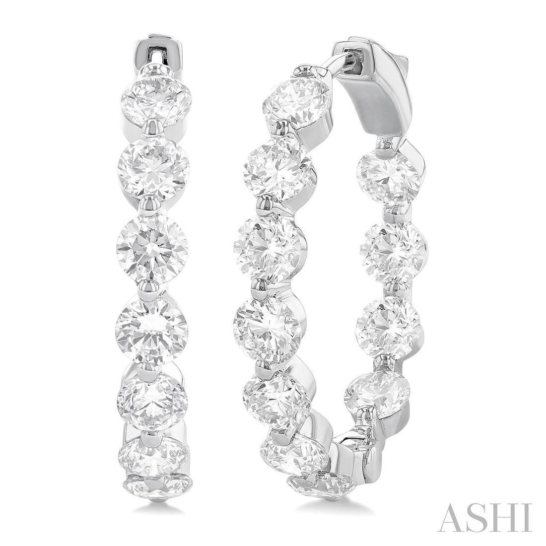 5.06 ctw Diamond 14K White Gold Hoop Earrings: Rare and radiant, this breathtaking Inside-Out Single Prong Set pair of earrings featuring White Diamond offers a touch of the extraordinary. A detailed Hoop gallery secures the stones, rendered in 6.