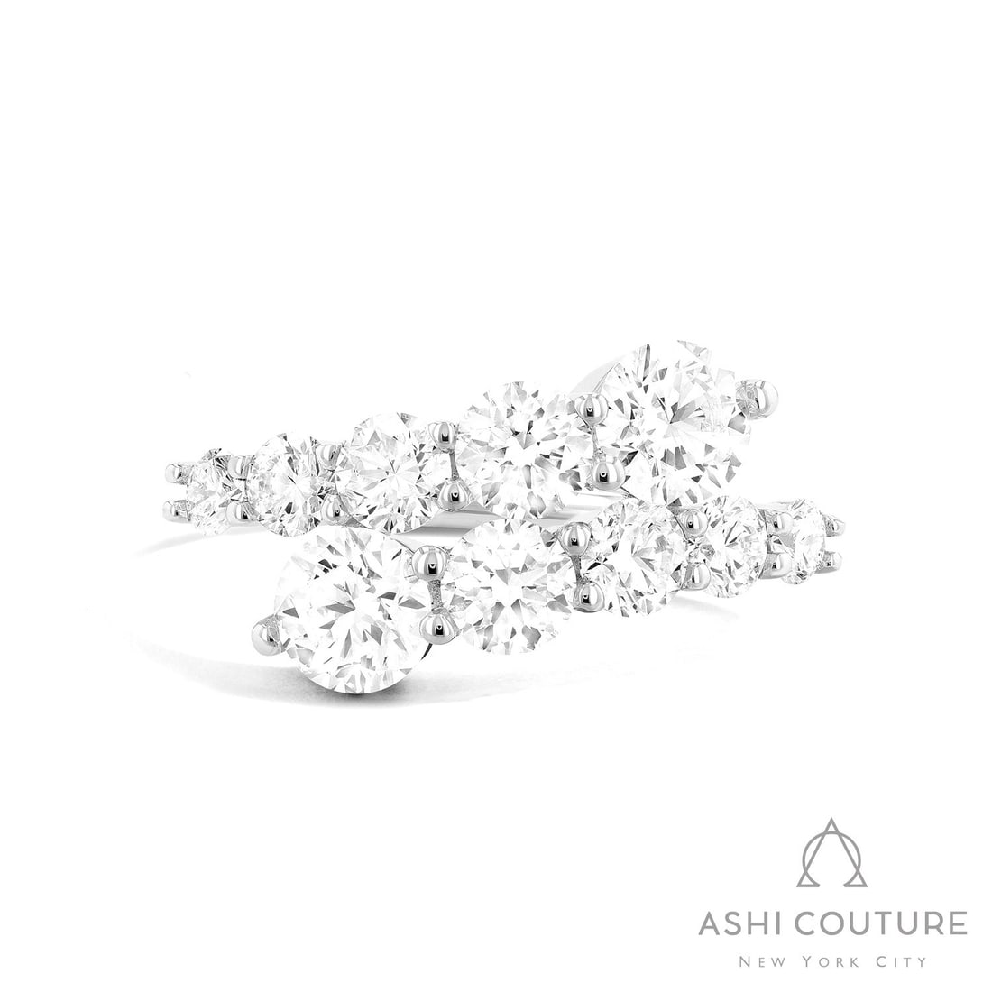 1.85 ctw White Diamond Dagr Wrap Bypass 18k White Gold Ring: Rare and radiant, this breathtaking Wrap ring featuring Natural Diamonds offers a touch of the extraordinary. Crafted with precision, the Bypass setting is seamlessly integrated into 4.25 grams of 18K
