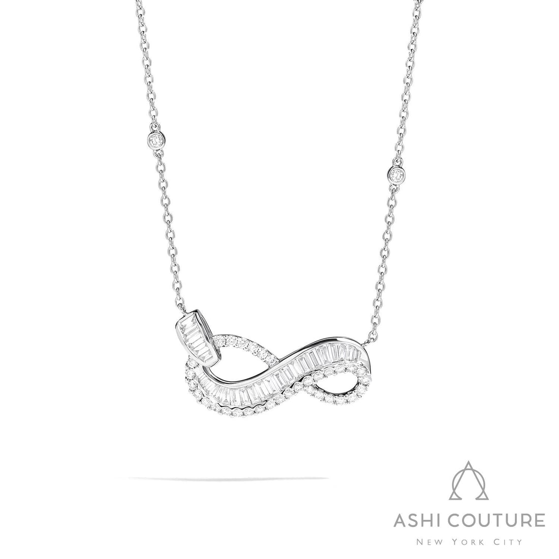 1.99 ctw Baguette and Round Diamond 18K White Gold Pendant Necklace: A symphony of light and color, this magnificent Infinity Love necklace featuring White Diamond embodies the pinnacle of luxury. Securely held in a classic Mixed-Cut Pave/Channel Pendant design, the ne