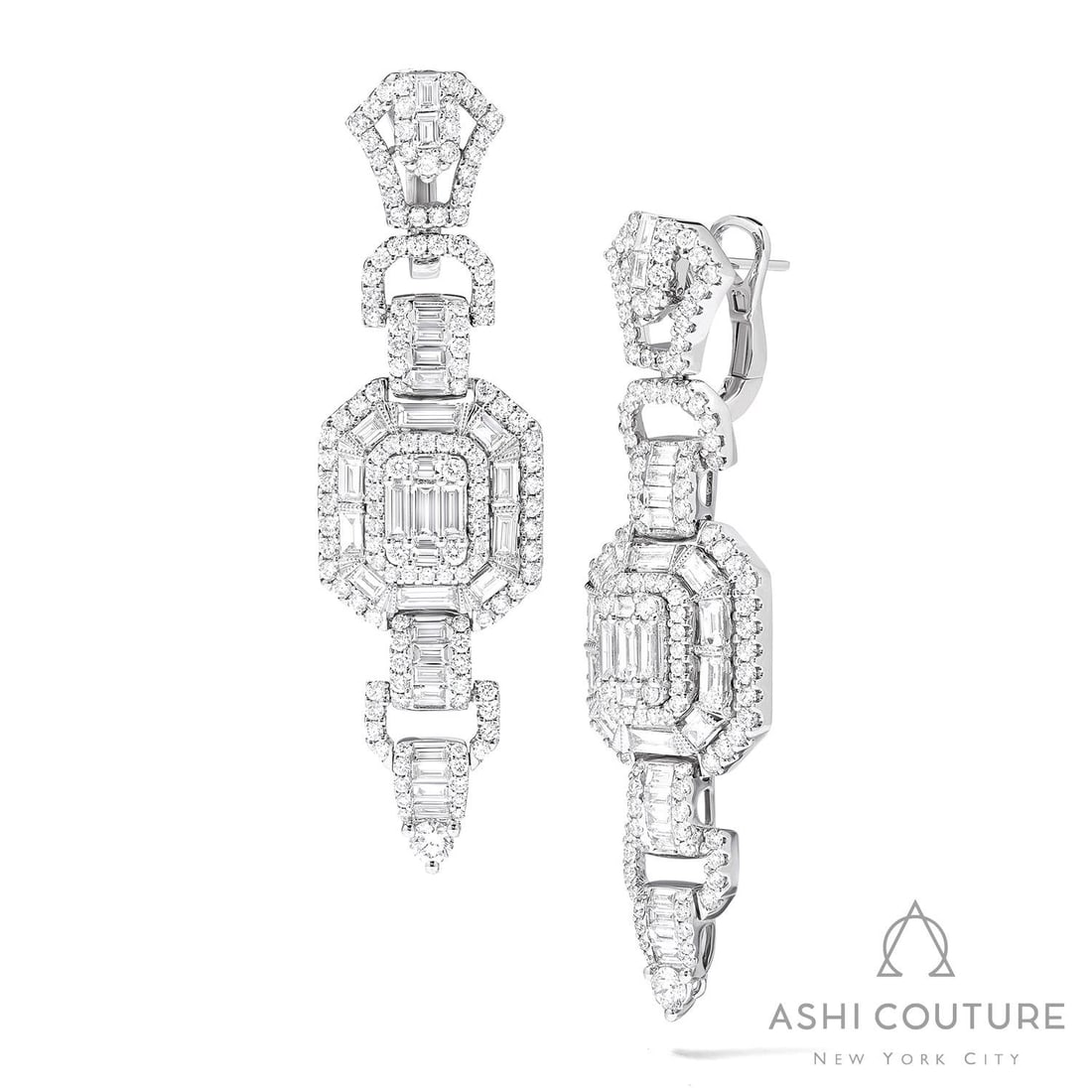 Empress Vintage 5.33 ctw Baguette Diamond 18K White Gold Earrings: Rare and radiant, this breathtaking Architectural pair of earrings featuring White Diamond offers a touch of the extraordinary. Crafted with precision, the Cluster setting is seamlessly integrated int