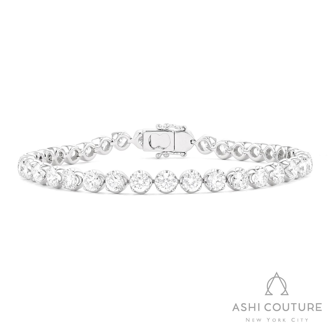7.92 ctw Diamond 18K White Gold Tennis Bracelet: Retail Value: $32,730 An exquisite masterpiece of haute joaillerie, this magnificent Classic tennis bracelet featuring White Diamond is a true treasure. Securely held in a classic Prong design, the br