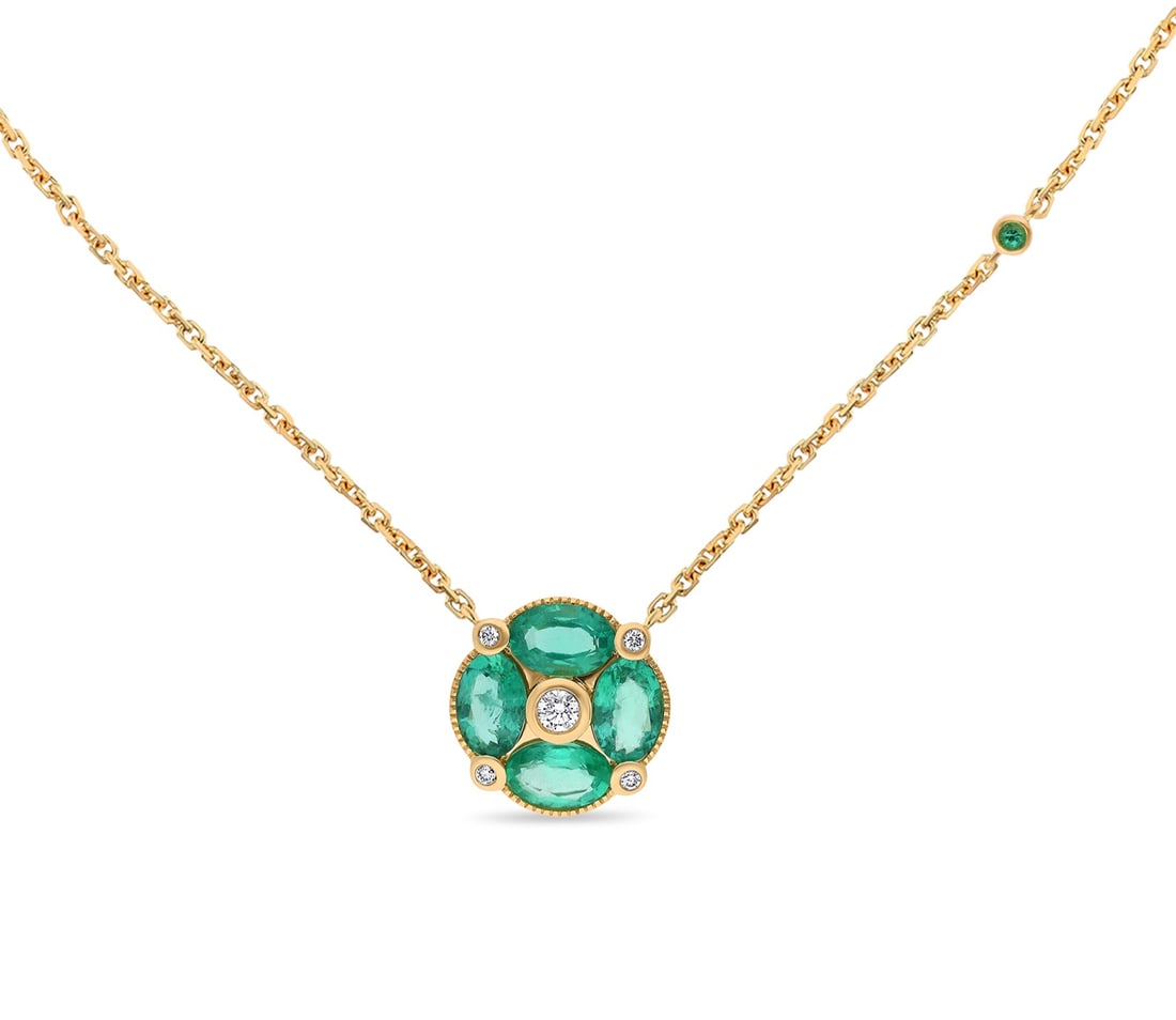 1.83ct Oval Emerald and 0.08ctw Diamond 18K Yellow Gold Pendant: Captured in a moment of brilliance, this exquisite Clover pendant featuring Emerald, White Diamond speaks to the connoisseur. The gemstones are nestled within a Cluster framework, supported by a subst