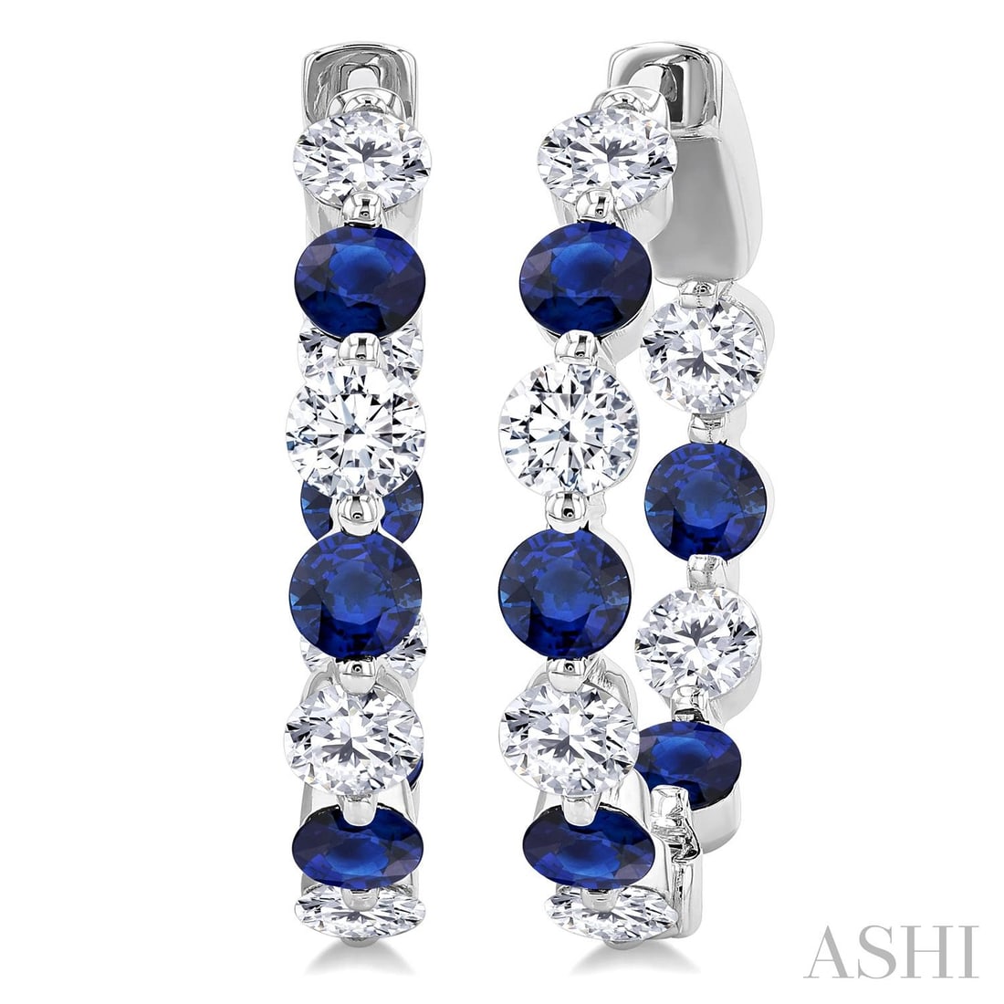 3.3mm Sapphire and 1.68 ctw Diamond Inside-Out 14K White Gold Hoop Earrings: A symphony of light and color, this breathtaking Inside-Out Alternating Hoop pair of earrings featuring Blue Sapphire, White Diamond embodies the pinnacle of luxury. Securely held in a classic Shared 