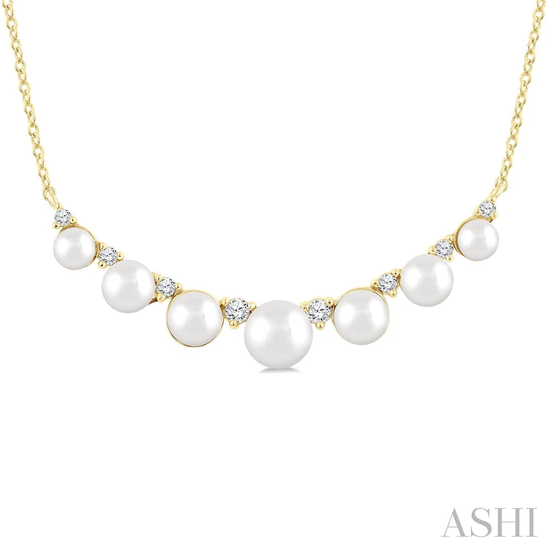 3.5mm-5mm Cultured Pearl and 0.14 ctw Diamond 10K Yellow Gold Necklace: Rare and radiant, this elegant Smile necklace featuring Cultured Pearl, White Diamond offers a touch of the extraordinary. A detailed Bar gallery secures the stones, rendered in 1.6 grams of lustrous 