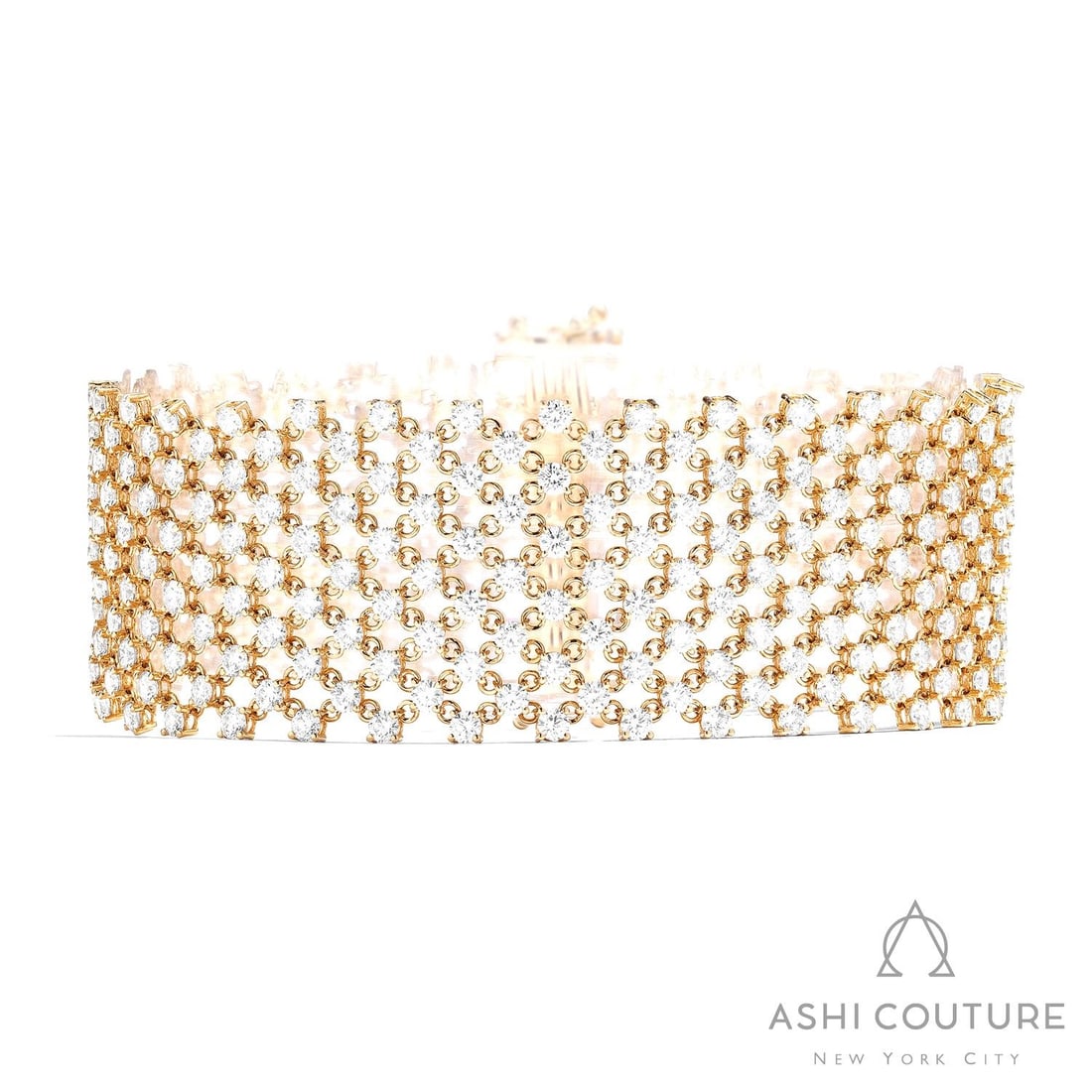 15.56 ctw White Diamond Silk Wide Mesh 18K Yellow Gold Bracelet: An exquisite masterpiece of haute joaillerie, this breathtaking Silk Wide Mesh bracelet featuring White Diamond is a true treasure. Showcasing the gems in a Mesh arrangement, the bracelet consists of 
