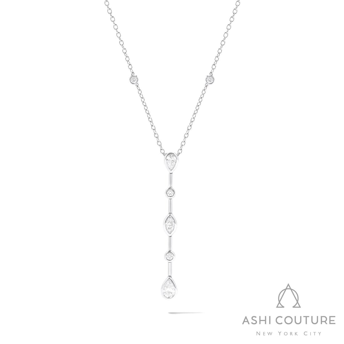 1.04 ctw Mixed Cut Diamond Bar Pendant 18K White Gold Necklace: Rare and radiant, this breathtaking Bar pendant necklace featuring White Diamonds offers a touch of the extraordinary. A detailed Bar gallery secures the stones, rendered in 2.05 grams of lustrous 18K