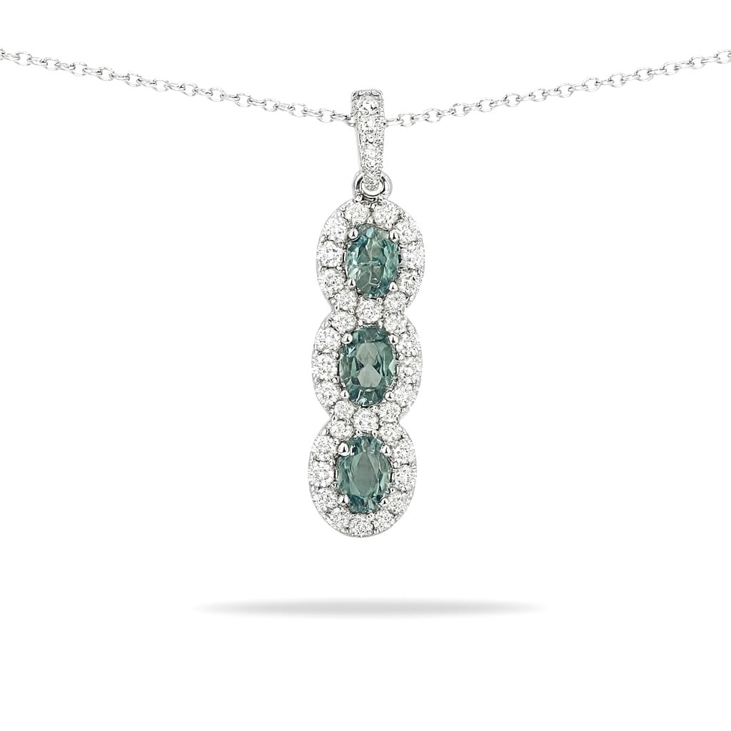 0.50ct Alexandrite and 0.34ctw Diamond 14K White Gold Pendant: A testament to superior craftsmanship, this breathtaking Halo pendant featuring Alexandrite, White Diamond is unparalleled. A detailed Halo gallery secures the stones, rendered in 1.22 grams of lustro