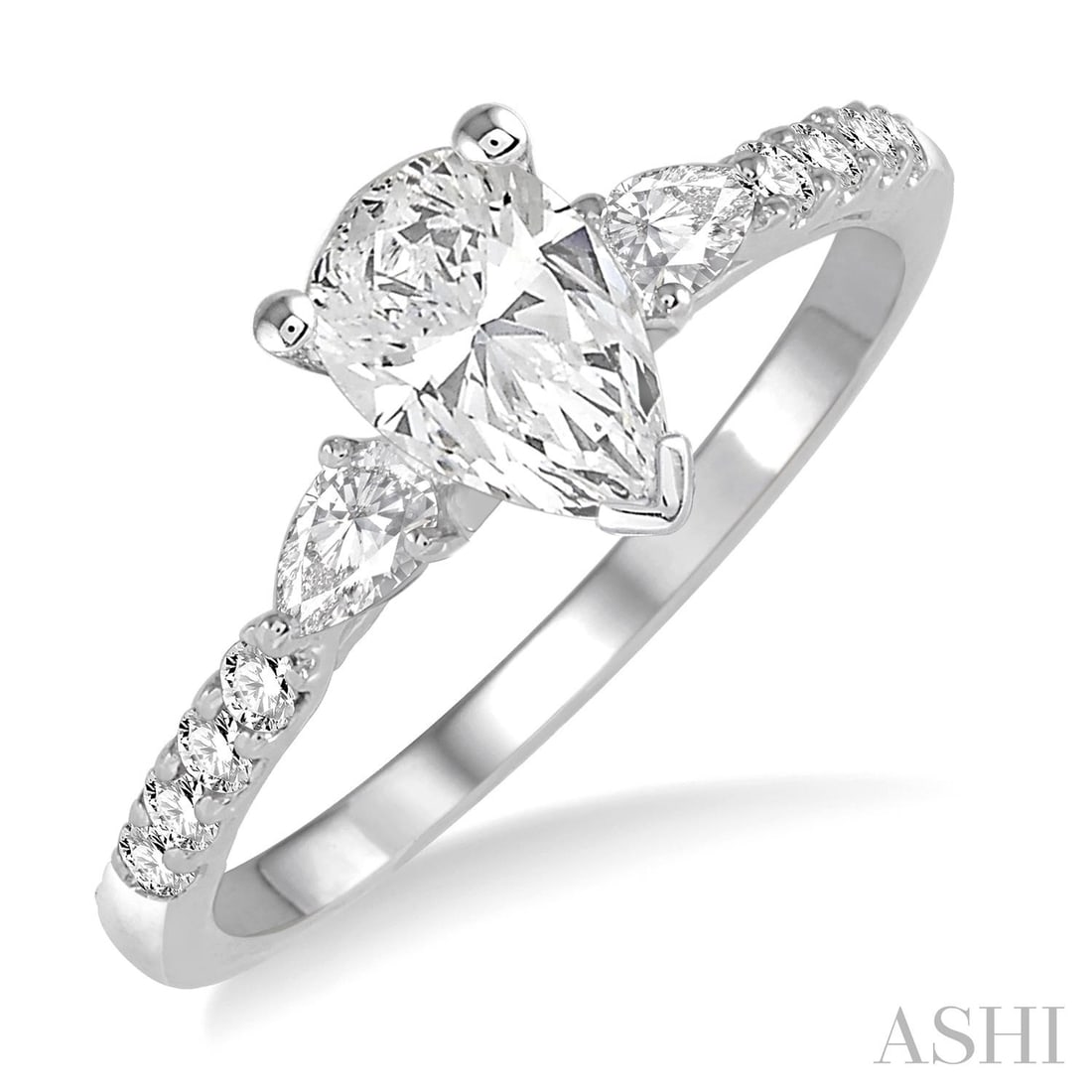 0.87 ctw Pear & Round Diamond Three-Stone 14K White Gold Engagement Ring: Epitomizing grandeur, this breathtaking Triple Mount ring featuring Natural Diamonds stands as a beacon of refined taste. Crafted with precision, the Three-Stone setting is seamlessly integrated into 