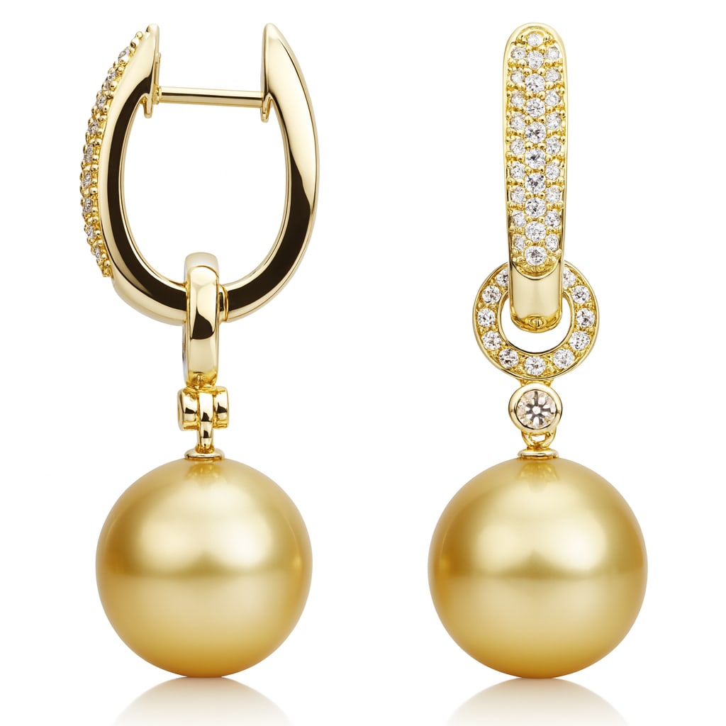 18k Yellow Gold Dangle Earrings with South Sea Pearls and Diamonds: Exquisite and luminous, this pair of dangle earrings features the captivating allure of South Sea Pearls. Accentuated by the brilliance of White Diamonds, these earrings are crafted in 18k Yellow Gold