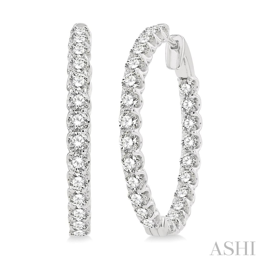 5.00 ctw Inside-Out White Diamond 14K White Gold Hoop Earrings: A vision of luxury, this stunning Inside-Out Hoop pair of earrings featuring White Diamond defines sophistication. The gemstones are nestled within a Continuous Line Hoop framework, supported by a sub