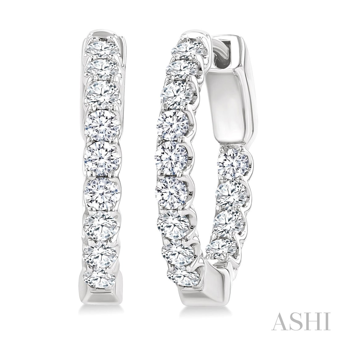 1.03 ctw White Diamond 14K White Gold Hoop Earrings: Exuding opulence and grace, this elegant Inside-Out pair of earrings featuring White Diamonds is crafted for the distinguished. A detailed Inside-Out Hoop gallery secures the stones, rendered in 4.85 