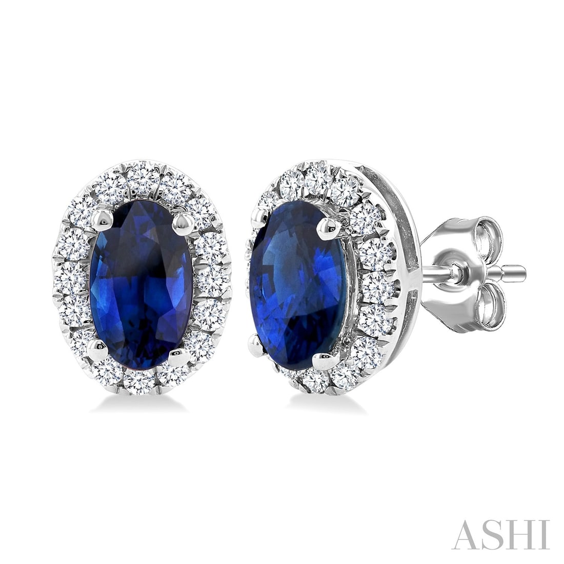5x3mm Blue Sapphire and 0.14 ctw Diamond 10K White Gold Stud Earrings: A testament to superior craftsmanship, this elegant Halo pair of earrings featuring Blue Sapphire, White Diamond is unparalleled. A detailed Halo gallery secures the stones, rendered in 0.7 grams of l