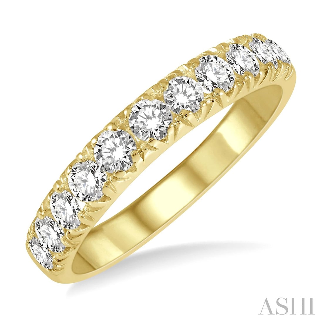 0.77 ctw Diamond 11 Stone 14K Yellow Gold Wedding Band Ring: Captured in a moment of brilliance, this stunning 11 Stone ring featuring White Diamond speaks to the connoisseur. Securely held in a classic Half-Eternity Band design, the ring is forged from 2.9 gra