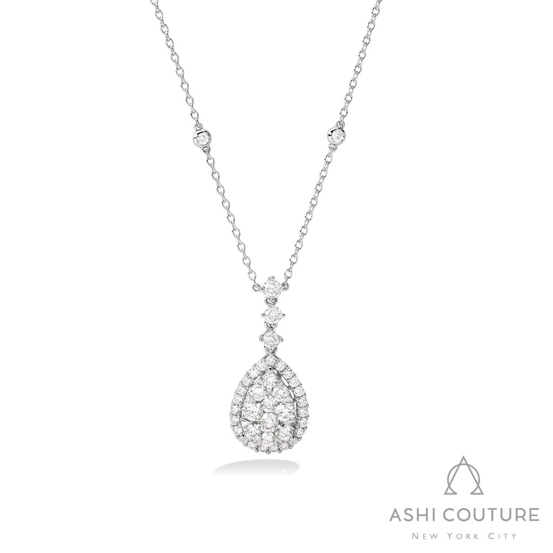 2.35 ctw Diamond Cluster 18K White Gold Pendant Necklace: A testament to superior craftsmanship, this breathtaking Fiori Pear Drop Cluster necklace featuring Natural Diamonds is unparalleled. Crafted with precision, the Cluster setting is seamlessly integrat