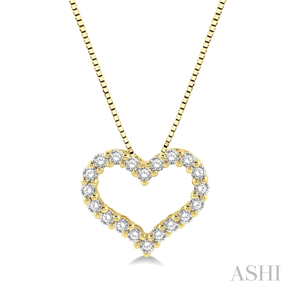 0.25 ctw Diamond 14K Yellow Gold Pendant: A testament to superior craftsmanship, this elegant Heart Shape pendant featuring White Diamond is unparalleled. Showcasing the gems in an Open Heart/Outline Setting arrangement, the pendant consists 