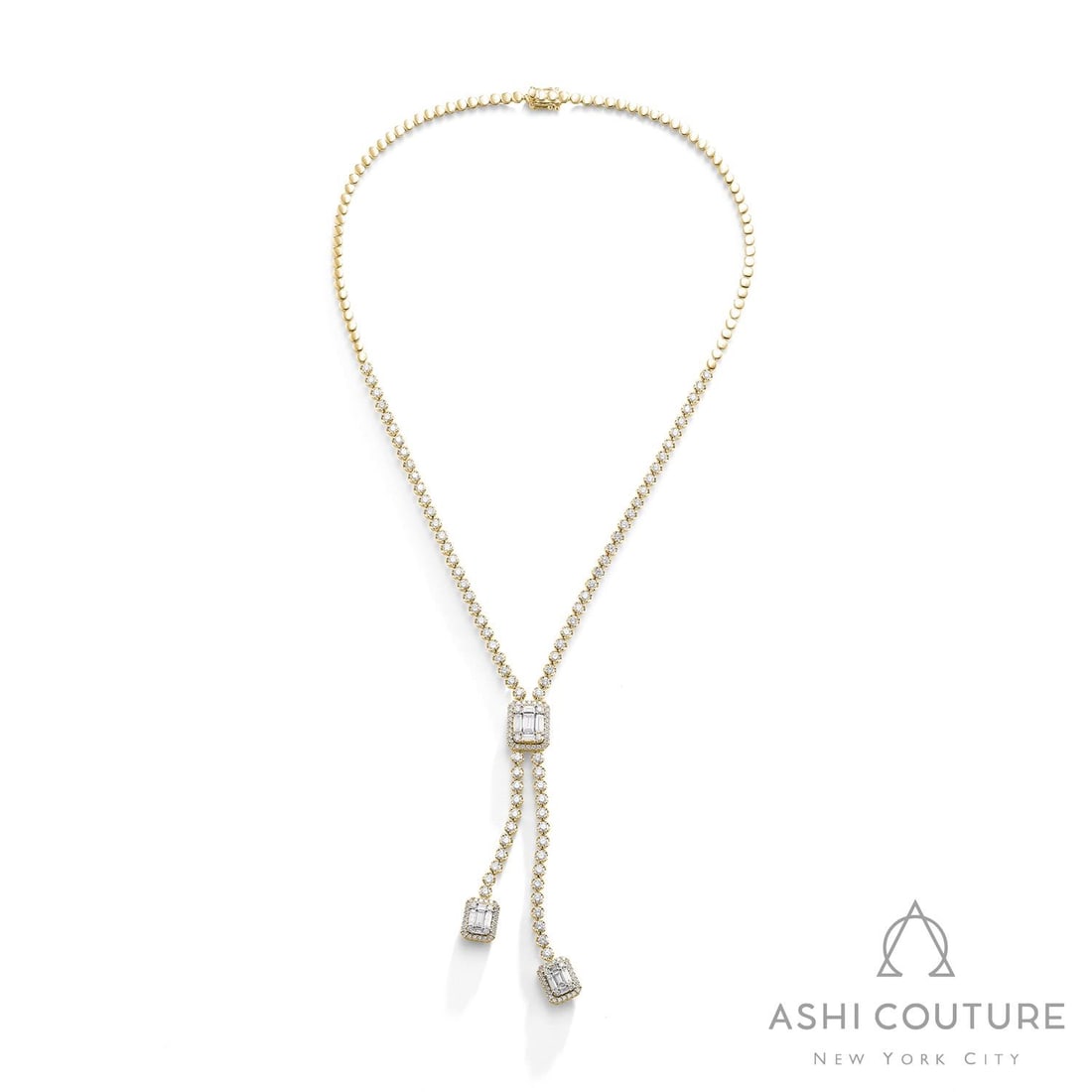 6.75 ctw Diamond 18K Yellow & White Gold Lariat Necklace: A symphony of light and color, this stunning Empress necklace featuring White Diamond embodies the pinnacle of luxury. Securely held in a classic Lariat design, the necklace is forged from 31.3 grams 