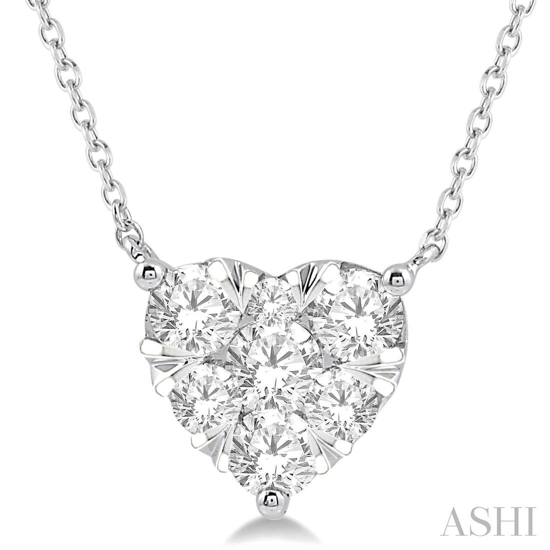 1.01 ctw Diamond Cluster Heart 14K White Gold Pendant Necklace: Captured in a moment of brilliance, this exquisite Cluster Heart necklace featuring White Diamond speaks to the connoisseur. Expertly mounted in a Cluster setting, the necklace is crafted in 1.0 grams