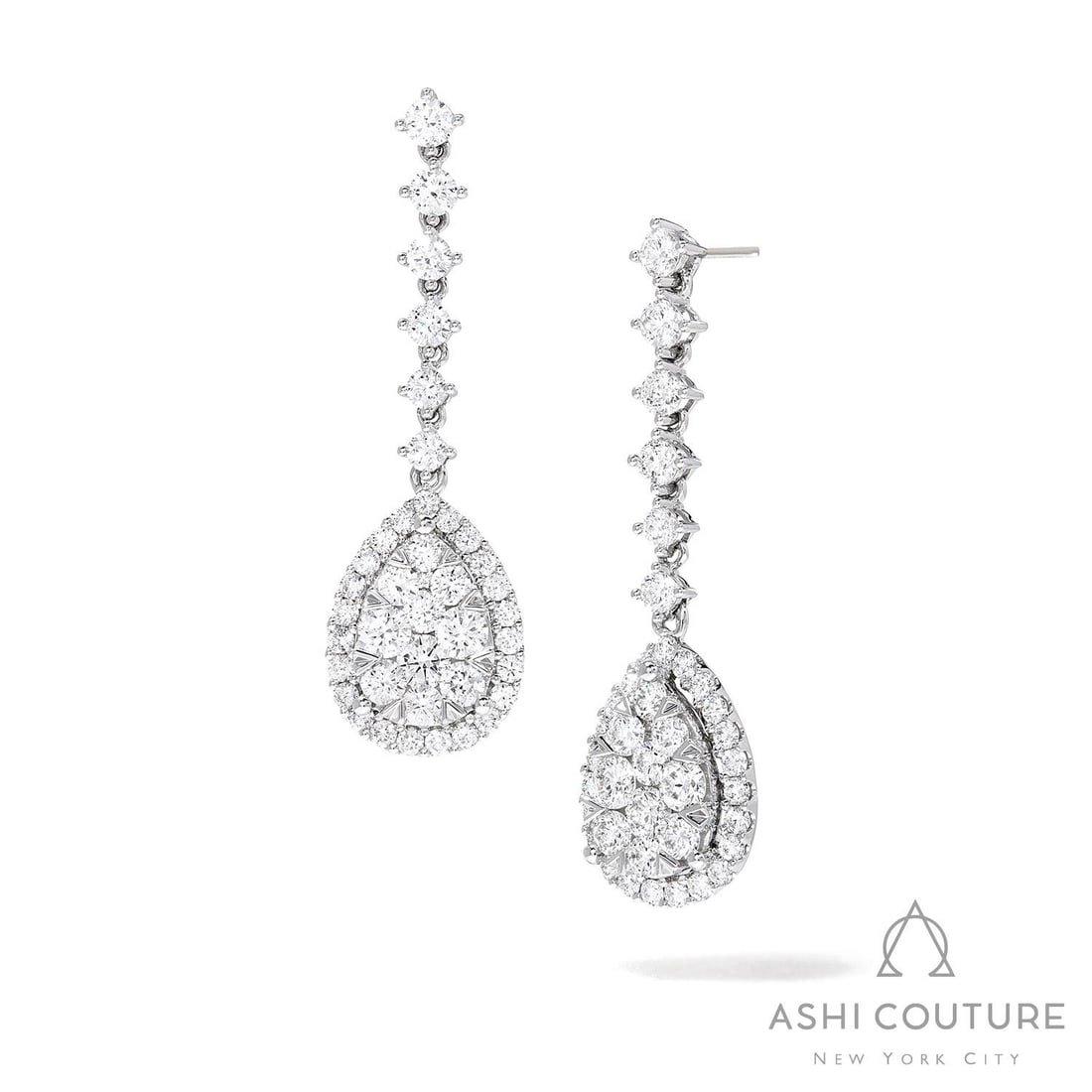 3.91 ctw White Diamond 18K White Gold Earrings: Captured in a moment of brilliance, this breathtaking Fiori Pear Drop Cluster pair of earrings featuring Natural Diamonds speaks to the connoisseur. Expertly mounted in a Drop/Cluster setting, the ear