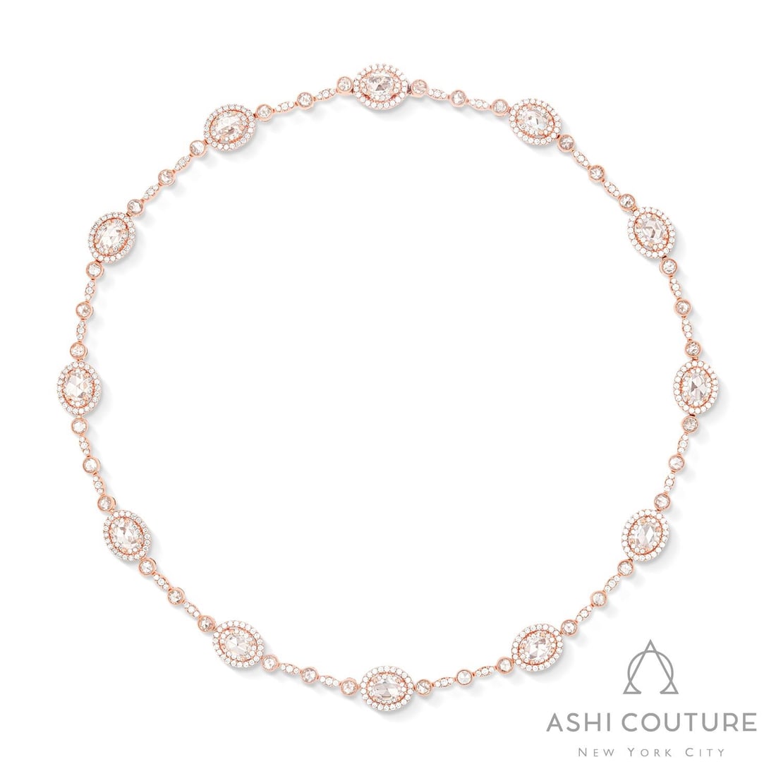 12.11 ctw Diamond Mademoiselle Station 18K Rose Gold Necklace: Timeless and sophisticated, this exquisite Floral-inspired necklace featuring White Diamond radiates enduring beauty. The gemstones are nestled within a Halo framework, supported by a substantial 32.0