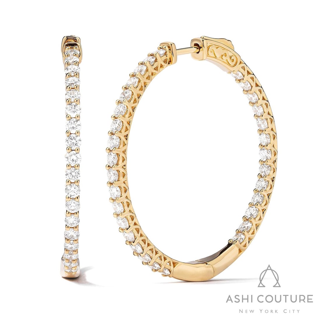 1.42 ctw Diamond Hoop Earrings 18k Yellow Gold: Retail Value: $11,655 Epitomizing grandeur, this magnificent Classic Hoop pair of earrings featuring White Diamond stands as a beacon of refined taste. Securely held in a classic Continuous Line desig