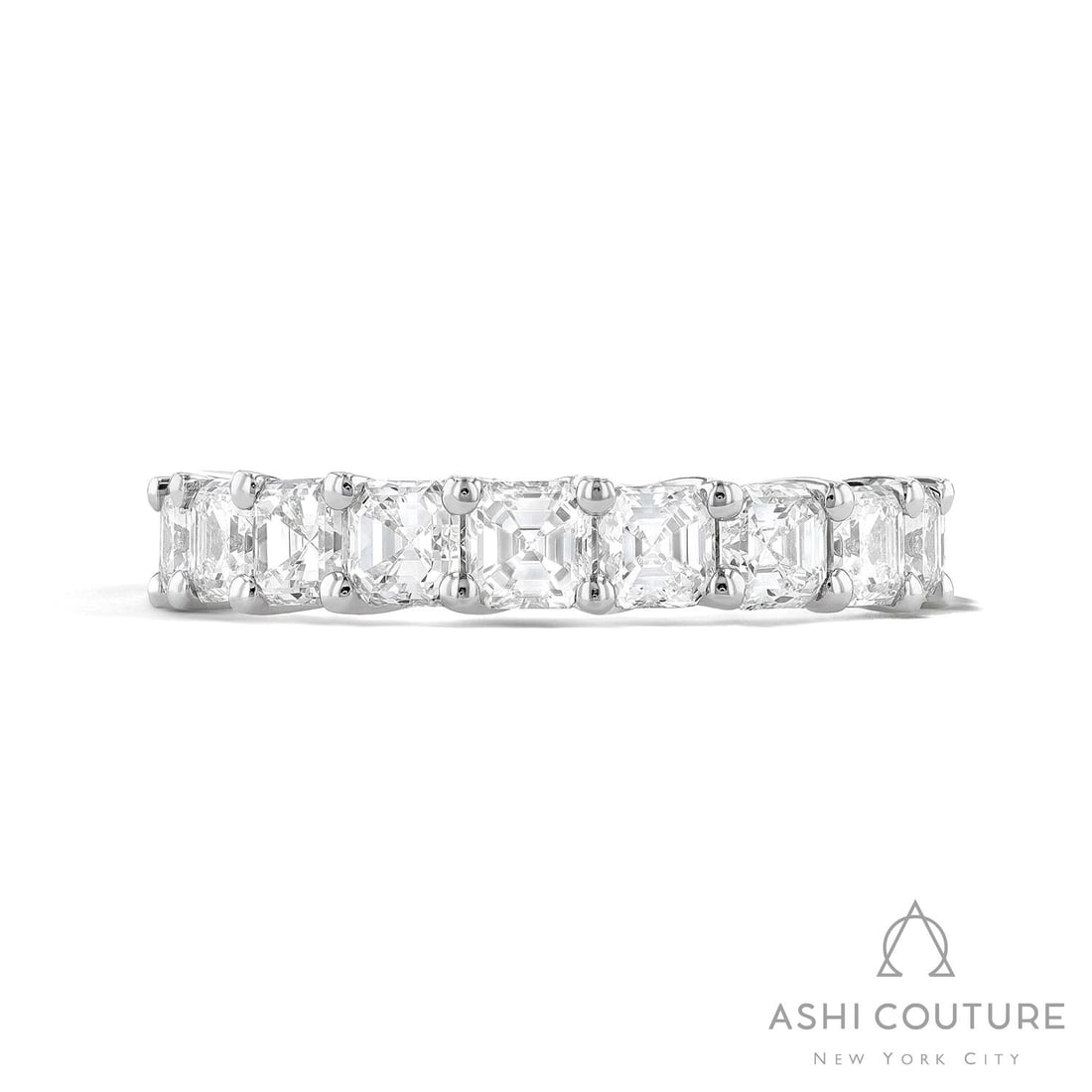 4.75 ctw Asscher Cut Diamond Eternity Band Platinum Ring: A vision of luxury, this magnificent Asscher Cut ring featuring White Diamond defines sophistication. The gemstones are nestled within an Eternity Band framework, supported by a substantial 5.0 g Plat