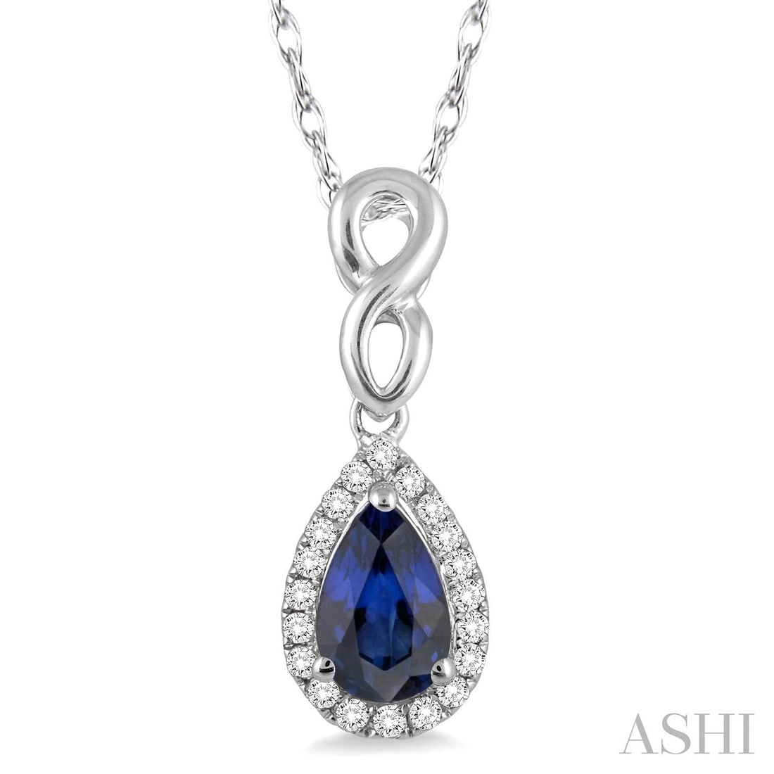 6x4 mm Pear Blue Sapphire and 0.09 ctw Diamond 10K White Gold Pendant: Epitomizing grandeur, this breathtaking Halo necklace featuring Blue Sapphire, White Diamond stands as a beacon of refined taste. Showcasing the gems in a Halo arrangement, the necklace consists of 0.