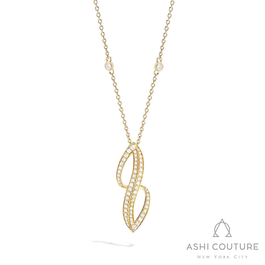 0.79 ctw White Diamond Dagr Curve 18K Yellow Gold Pendant Necklace: Captured in a moment of brilliance, this breathtaking Dagr Curve necklace featuring White Diamond speaks to the connoisseur. Securely held in a classic Micro-Pave Ribbon design, the necklace is forged