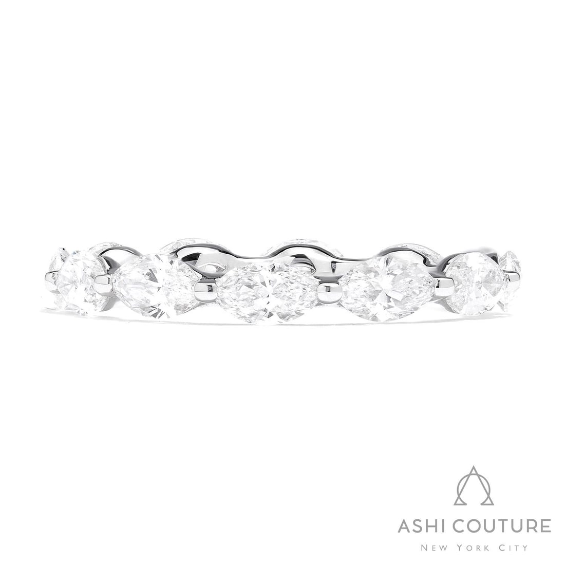 2.40 ctw Marquise Diamond Eternity Band 18K White Gold Ring: A symphony of light and color, this breathtaking Duchess Marquise Eternity Band ring featuring White Diamond embodies the pinnacle of luxury. Securely held in a classic Eternity Band design, the ring 