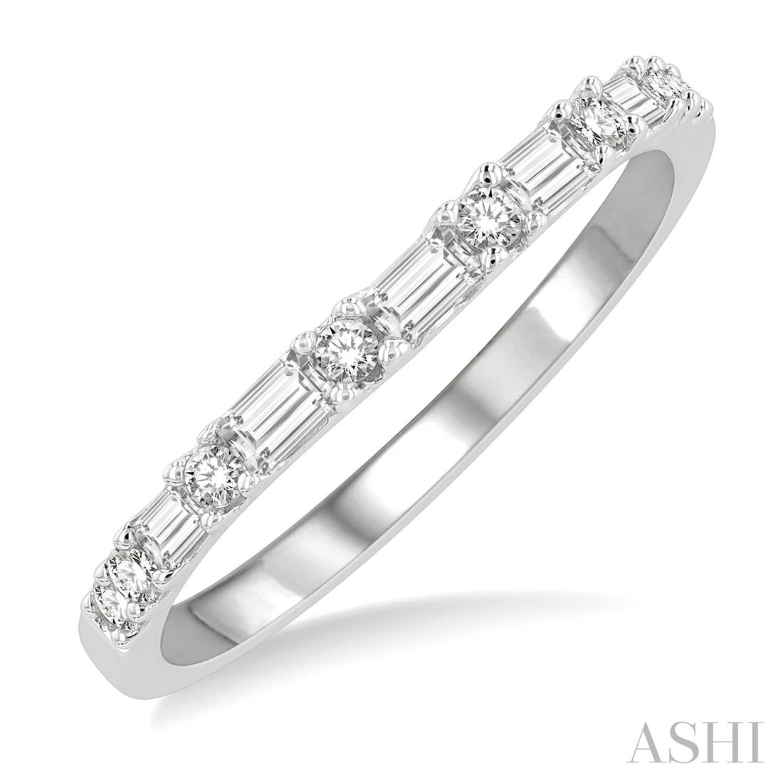 0.31 ctw Baguette & Round Diamond Wedding Band 14K White Gold: Epitomizing grandeur, this stunning Baguette ring featuring White Diamond stands as a beacon of refined taste. A detailed Half-Eternity Band gallery secures the stones, rendered in 1.5 grams of lustro