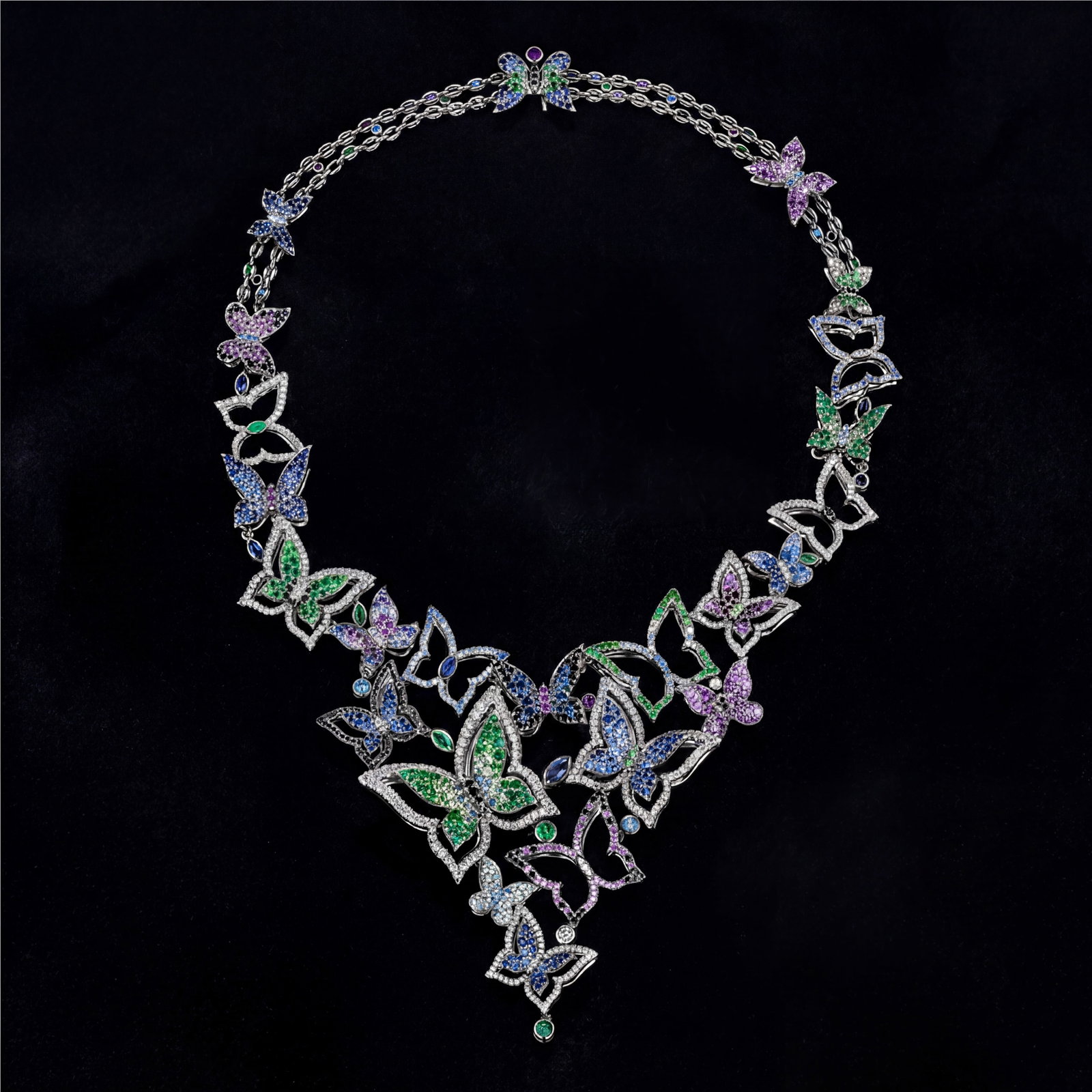 27.3 ctw Blue Sapphire and 4.55 ctw White Diamond Platinum Necklace: Retail Value: $118,080 A vision of luxury, this magnificent Butterfly necklace featuring Blue Sapphire, Ruby, Amethyst, Pink Sapphire, Yellow Sapphire, Tsavorite, White Diamond defines sophistication.