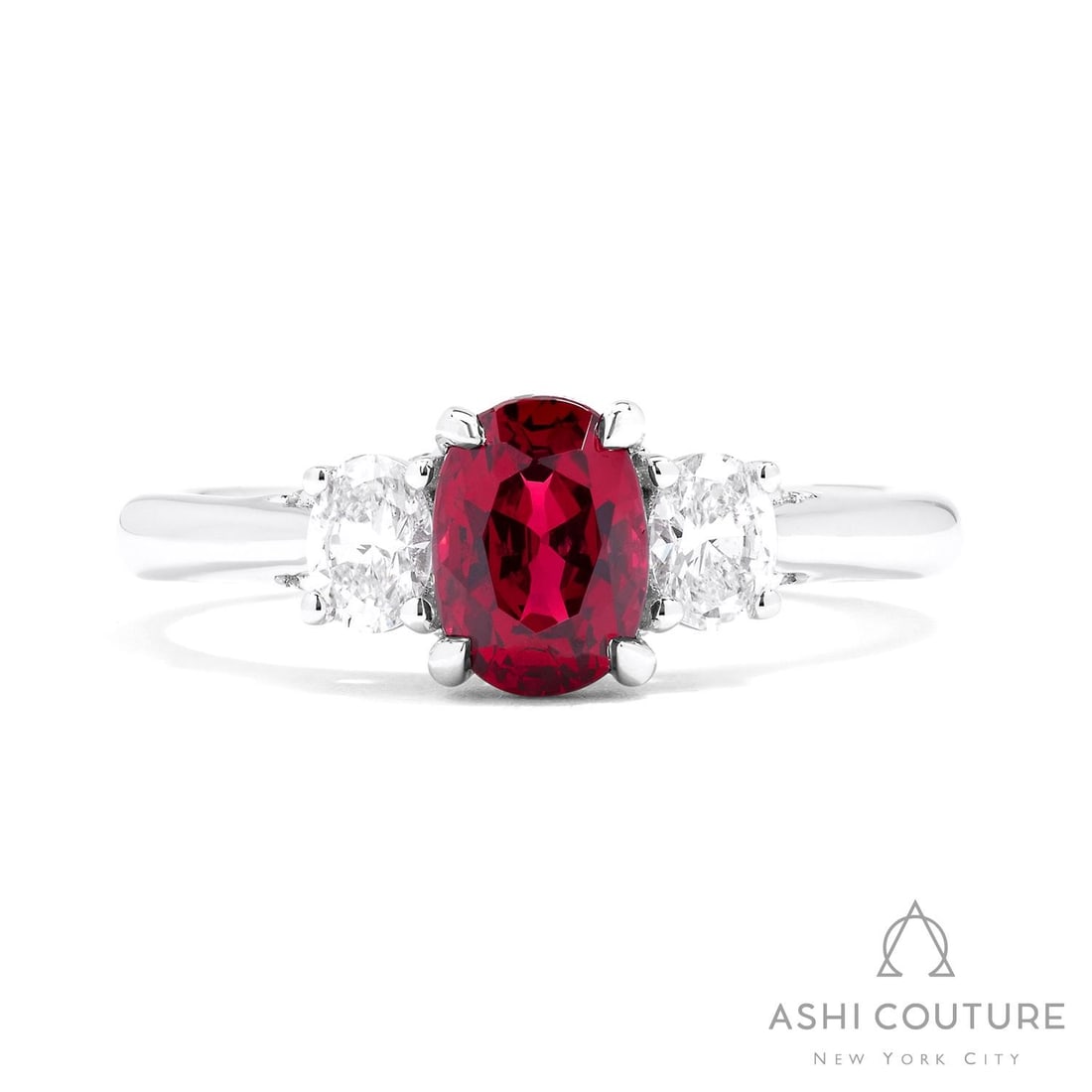 Oval Ruby and 0.47 ctw White Diamond 18k White Gold Ring: Retail Value: $9,165 Timeless and sophisticated, this magnificent 3-Stone ring featuring Ruby, White Diamond radiates enduring beauty. A detailed Three-Stone gallery secures the stones, rendered in 3.