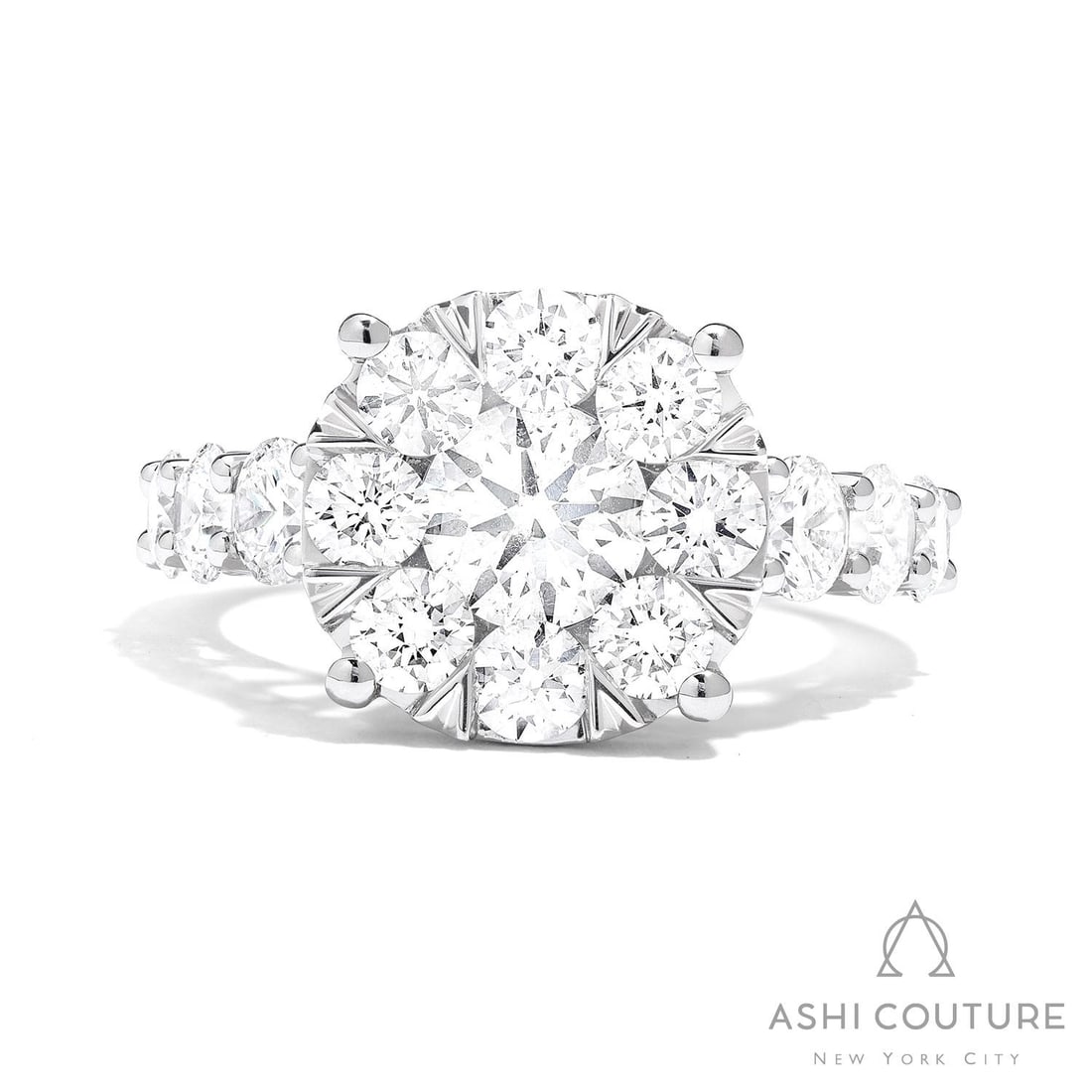 3.06 ctw White Diamond Fiori Cluster Cocktail 18K White Gold Ring: Epitomizing grandeur, this exquisite Fiori Cluster ring featuring White Diamonds stands as a beacon of refined taste. Showcasing the gems in a Cluster arrangement, the ring consists of 6.45 grams of 1