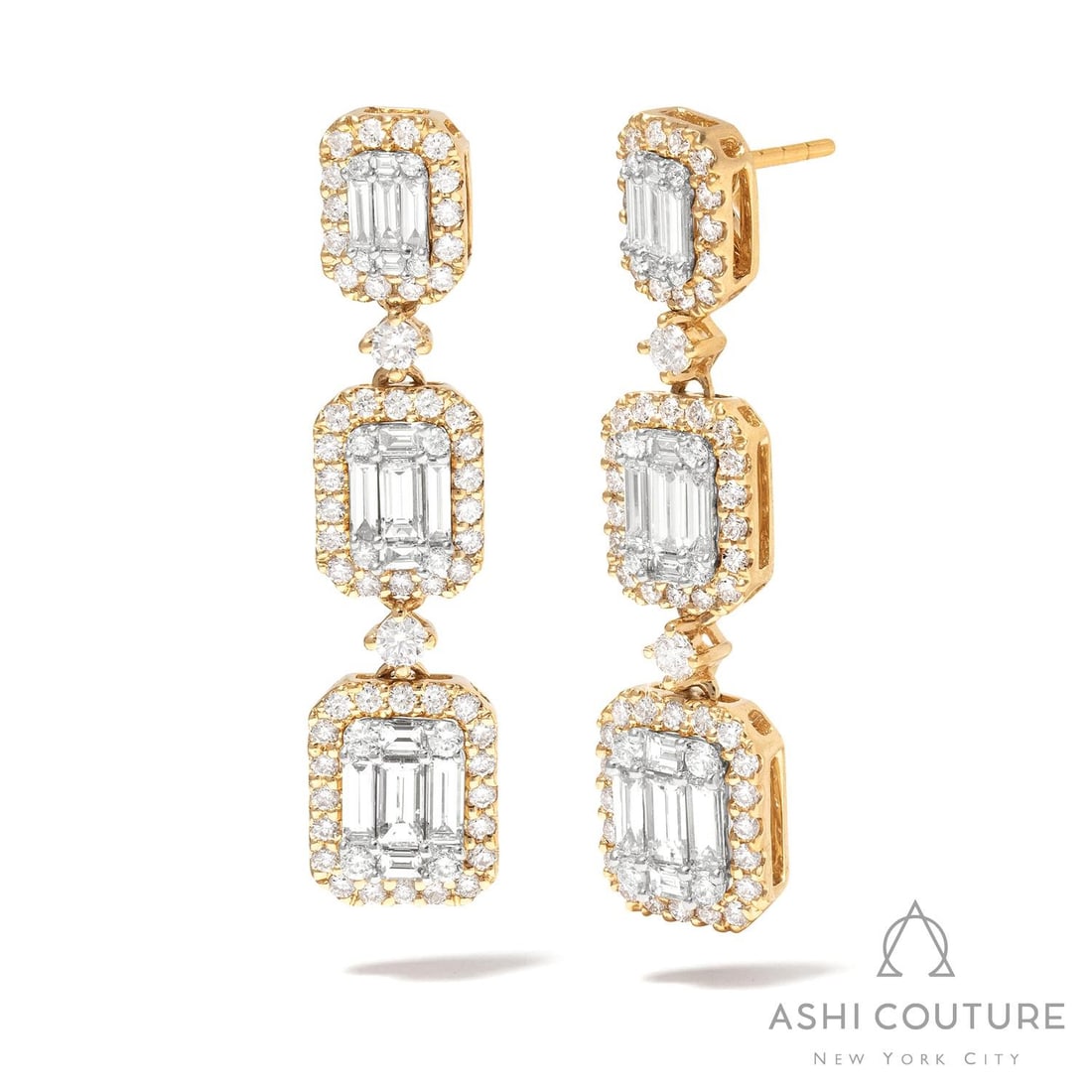 2.11 ctw Graduating Baguette Diamond 18K Yellow & White Gold Earrings: A symphony of light and color, this breathtaking Graduating Station pair of earrings featuring White Diamond embodies the pinnacle of luxury. Expertly mounted in a Halo setting, the earrings is crafte