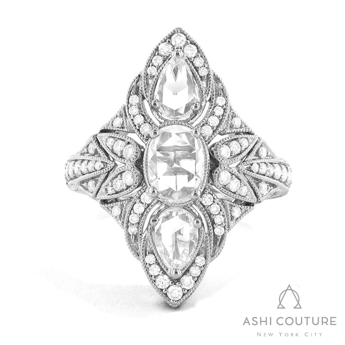 1.96 ctw Vintage Diamond Cluster 18K White Gold Ring: An exquisite masterpiece of haute joaillerie, this magnificent Vintage Cluster ring featuring Diamond is a true treasure. Showcasing the gems in a Cluster arrangement, the ring consists of 8.7 grams o