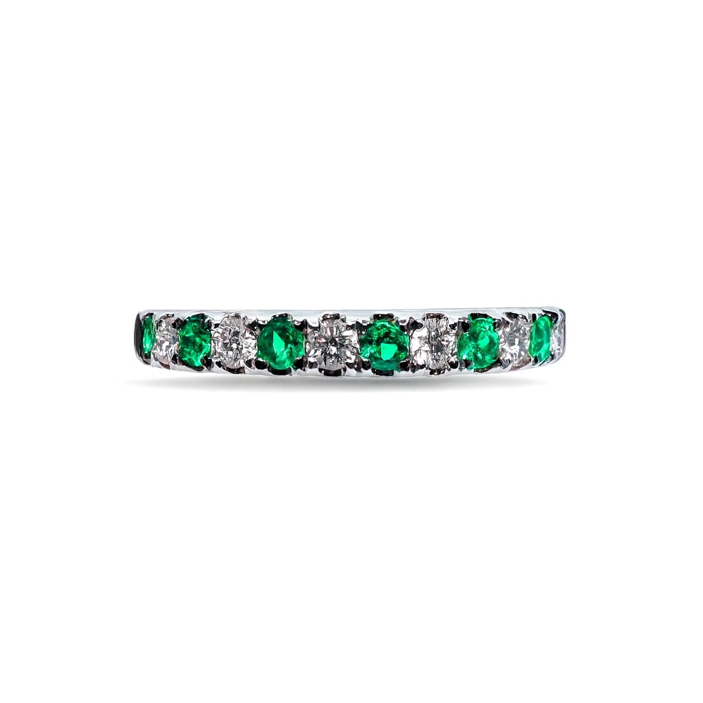 0.22ct Emerald & 0.23ct Diamond Band Ring 14K White Gold: A testament to superior craftsmanship, this exquisite Alternating Band ring featuring Emerald, White Diamond is unparalleled. A detailed Shared Prong gallery secures the stones, rendered in 2.3 grams 