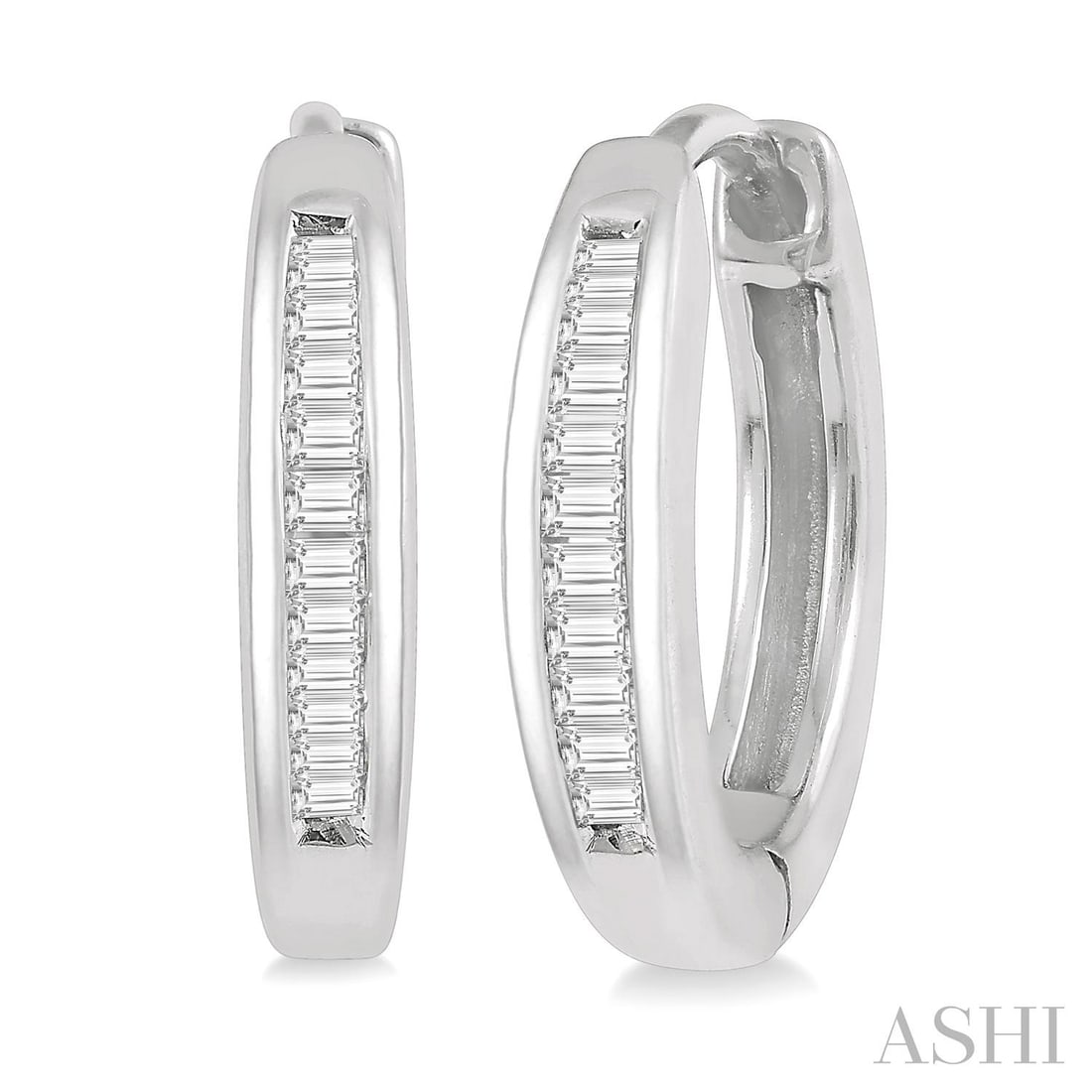 0.10 ctw White Diamond 10K White Gold Huggie Earrings: Epitomizing grandeur, this elegant Inlay Petite Baguette pair of earrings featuring White Diamonds stands as a beacon of refined taste. Showcasing the gems in a Channel-Set Hoop arrangement, the earri