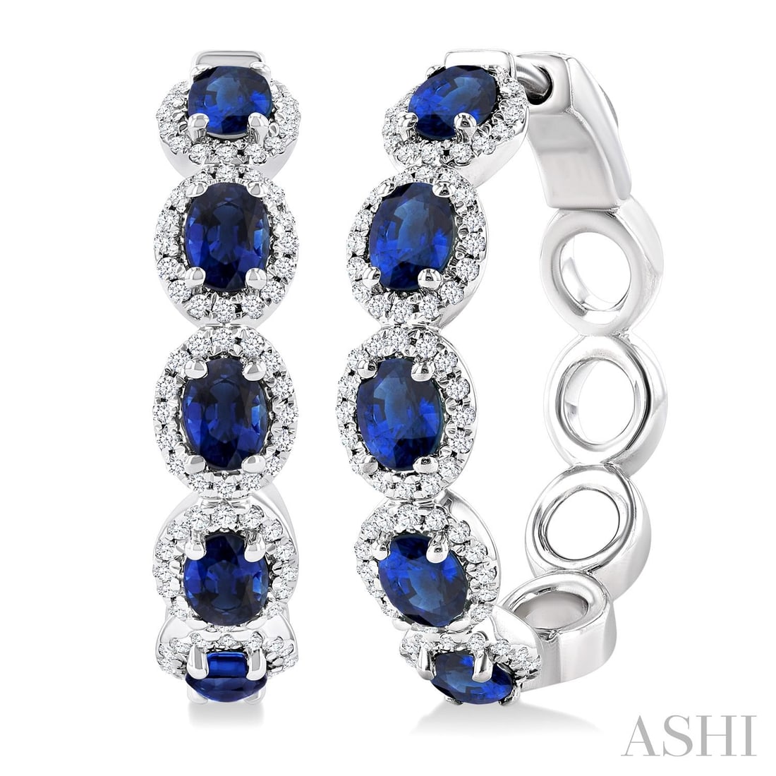 4x3 mm Oval Sapphire and 0.49 ctw Diamond 14K White Gold Hoop Earrings: Defining modern elegance, this stunning Halo pair of earrings featuring Sapphire, White Diamond captures the essence of style. Expertly mounted in a Halo setting, the earrings are crafted in 8.6 grams