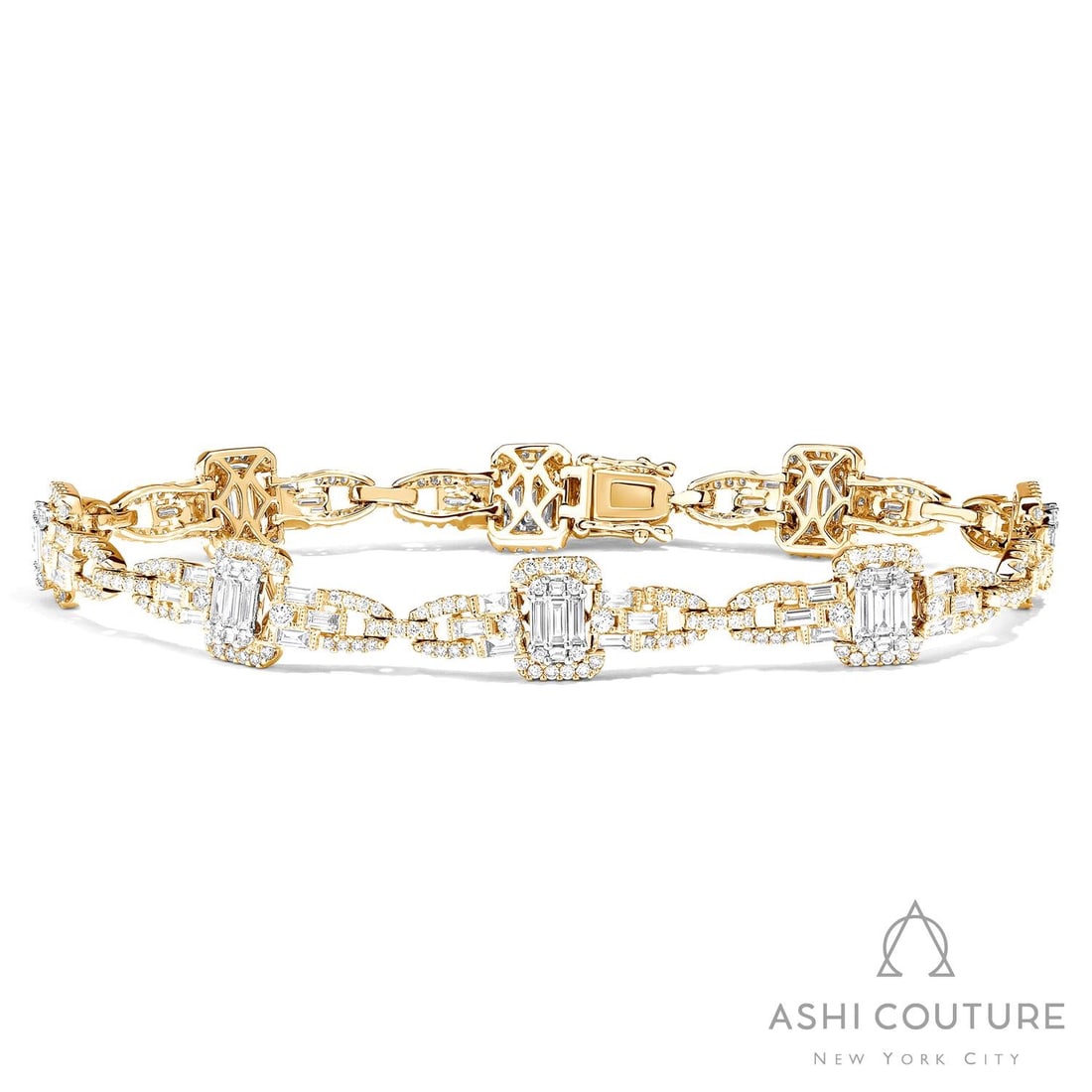 3.9 ctw Baguette & Round Diamond 18K Yellow & White Gold Link Bracelet: A testament to superior craftsmanship, this breathtaking Baguette Link bracelet featuring White Diamond is unparalleled. A detailed Cluster/Halo gallery secures the stones, rendered in 14.9 grams of l