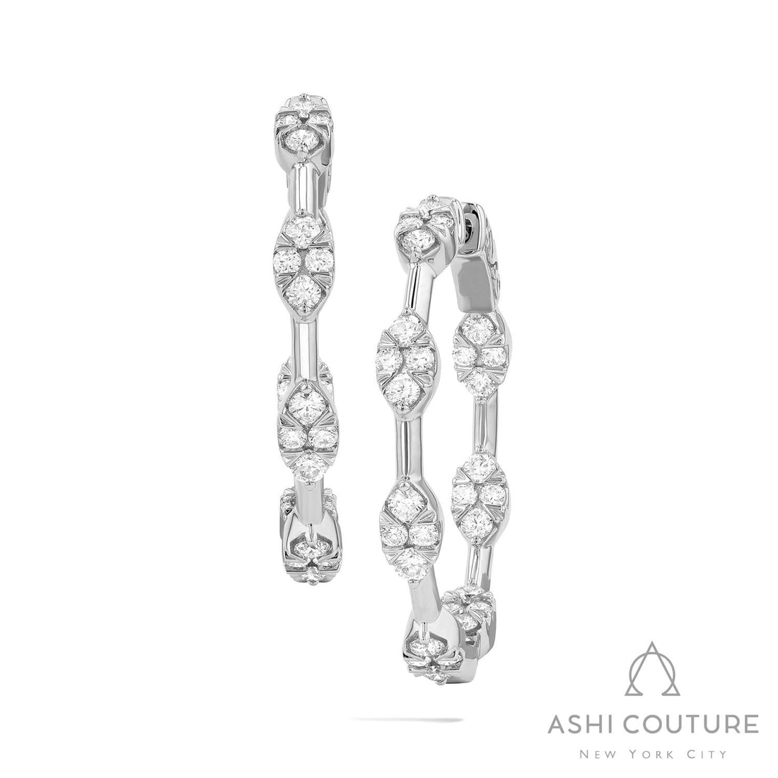 1.53 ctw White Diamond Fiori Marquise Bar Cluster 18K White Gold Hoop Earrings: Exuding opulence and grace, this stunning Marquise Bar Hoop pair of earrings featuring Natural Diamonds is crafted for the distinguished. Showcasing the gems in a Cluster arrangement, the earrings con