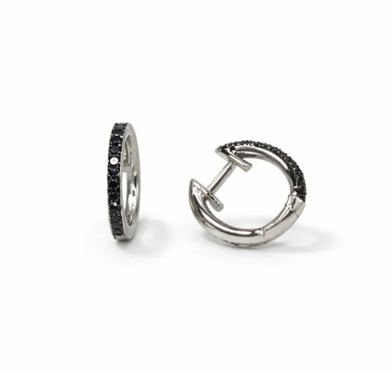 0.18ctw Black Diamond 14K White Gold Huggies: A vision of luxury, this elegant Huggie Hoop pair of earrings featuring Black Diamonds defines sophistication. Securely held in a classic Huggie Hoop design, the earrings are forged from high-polish 1