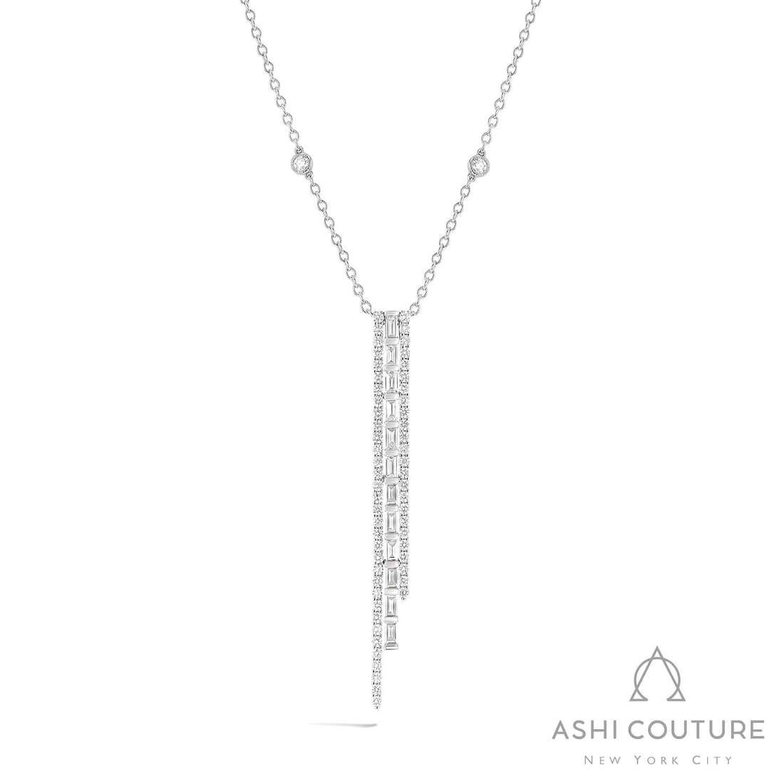 1.52 ctw Baguette & Round Diamond 18K White Gold Pendant: A vision of luxury, this breathtaking Graduating 3-Row pendant featuring White Diamond defines sophistication. The gemstones are nestled within a Linear Drop framework, supported by a substantial 3.4 
