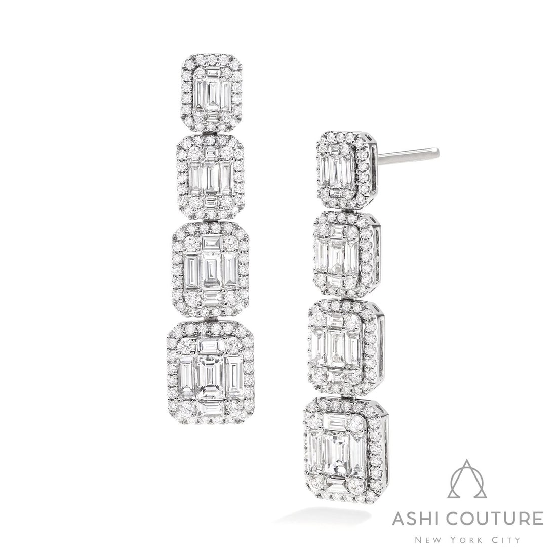 Empress 5.05 ctw Graduating Baguette Diamond 18K White Gold Drop Earrings: Captured in a moment of brilliance, this exquisite Graduating Baguette Drop pair of earrings featuring White Diamonds speaks to the connoisseur. Securely held in a classic Cluster design, the earrings
